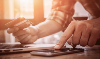 Someone using card on smart phone